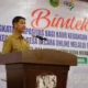 Asisten Bidang Pemerintahan dan Hukum, Sudandri Jauzah saat memberikan sambutan sekaligus membuka Bimtek Siskeudes Bagi Kaur Keuangan Desa di Ballroom Grand Meranti Hotel.